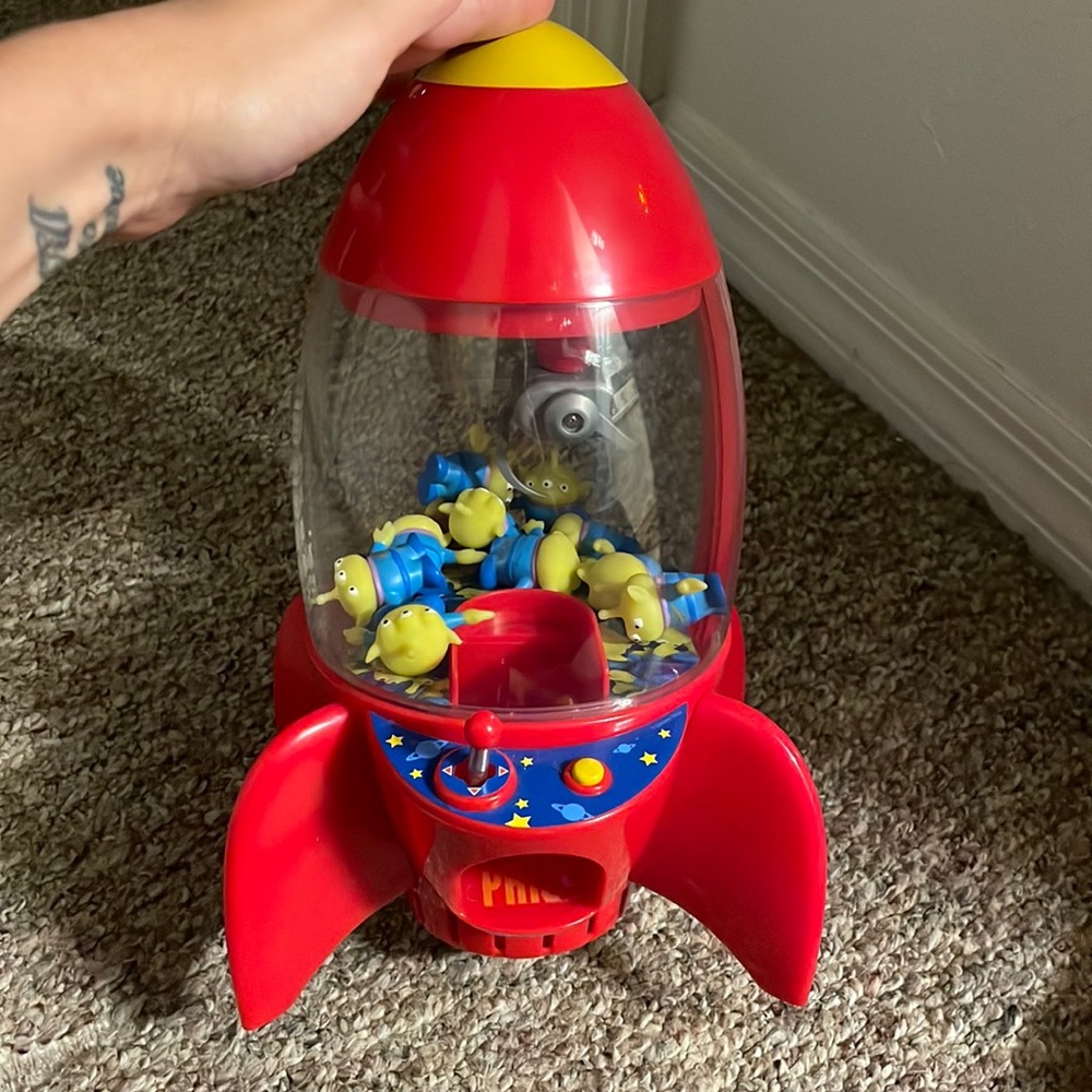 Pizza planet space crane toy.